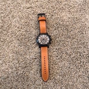 Leather and black fossil watch
